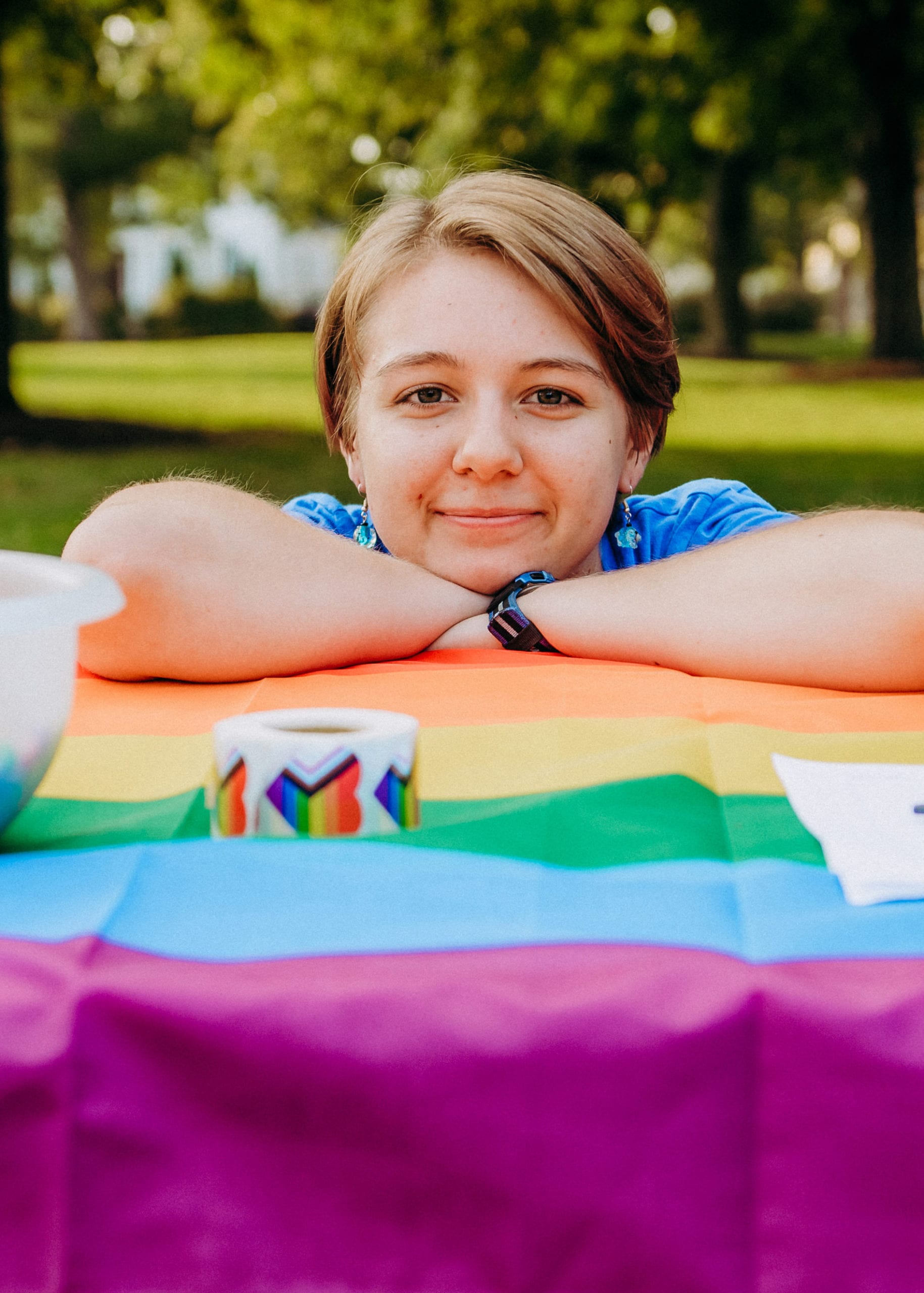 student leaning on table