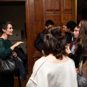 woman teaching to group of students