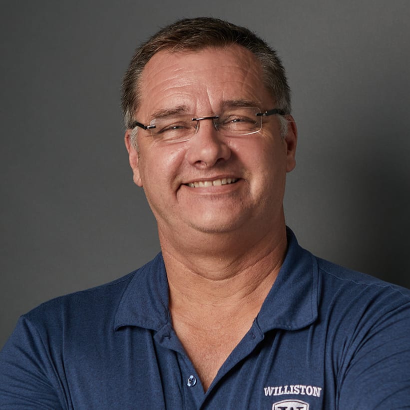 man with glasses smiling