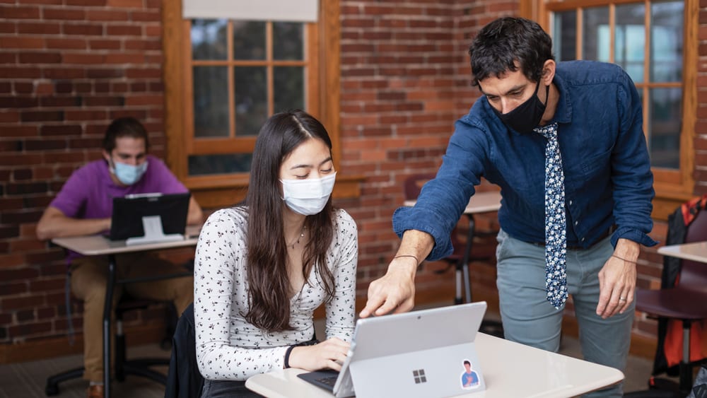 teacher and student wearing face masks