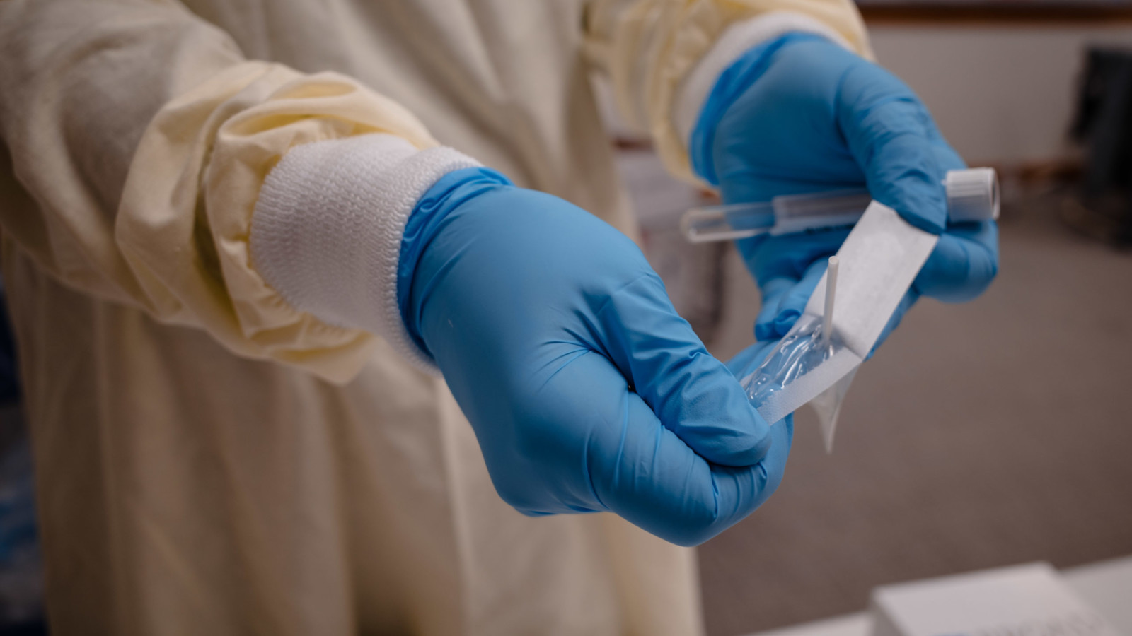 nurse opening swab