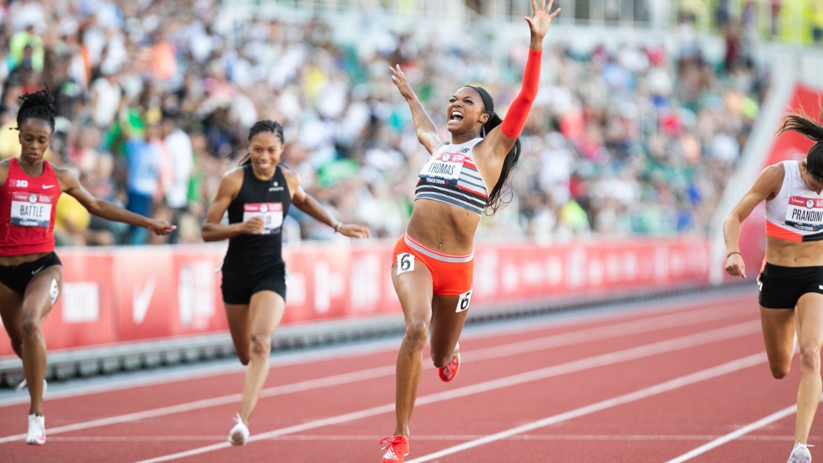 women in finishing moment of a running race