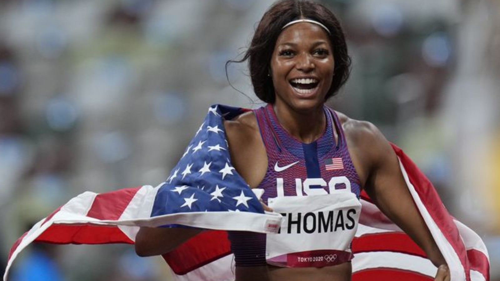 gabrielle thomas with us flag