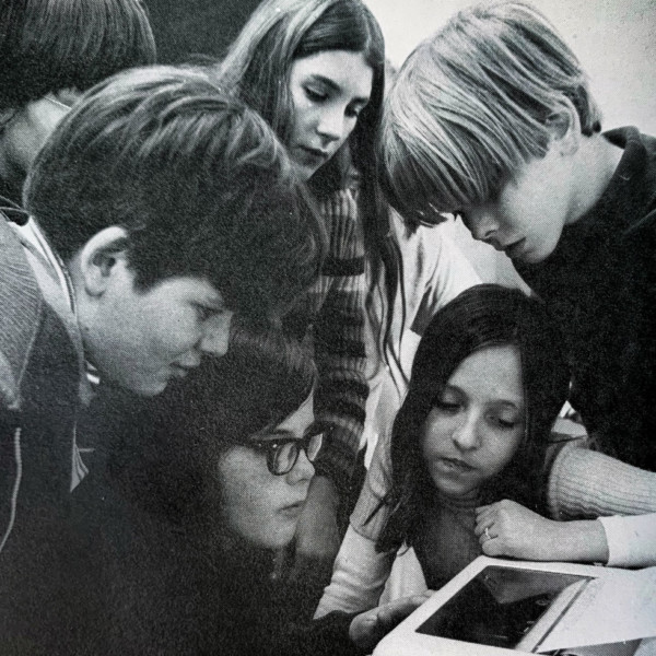 students with computers in the past and present