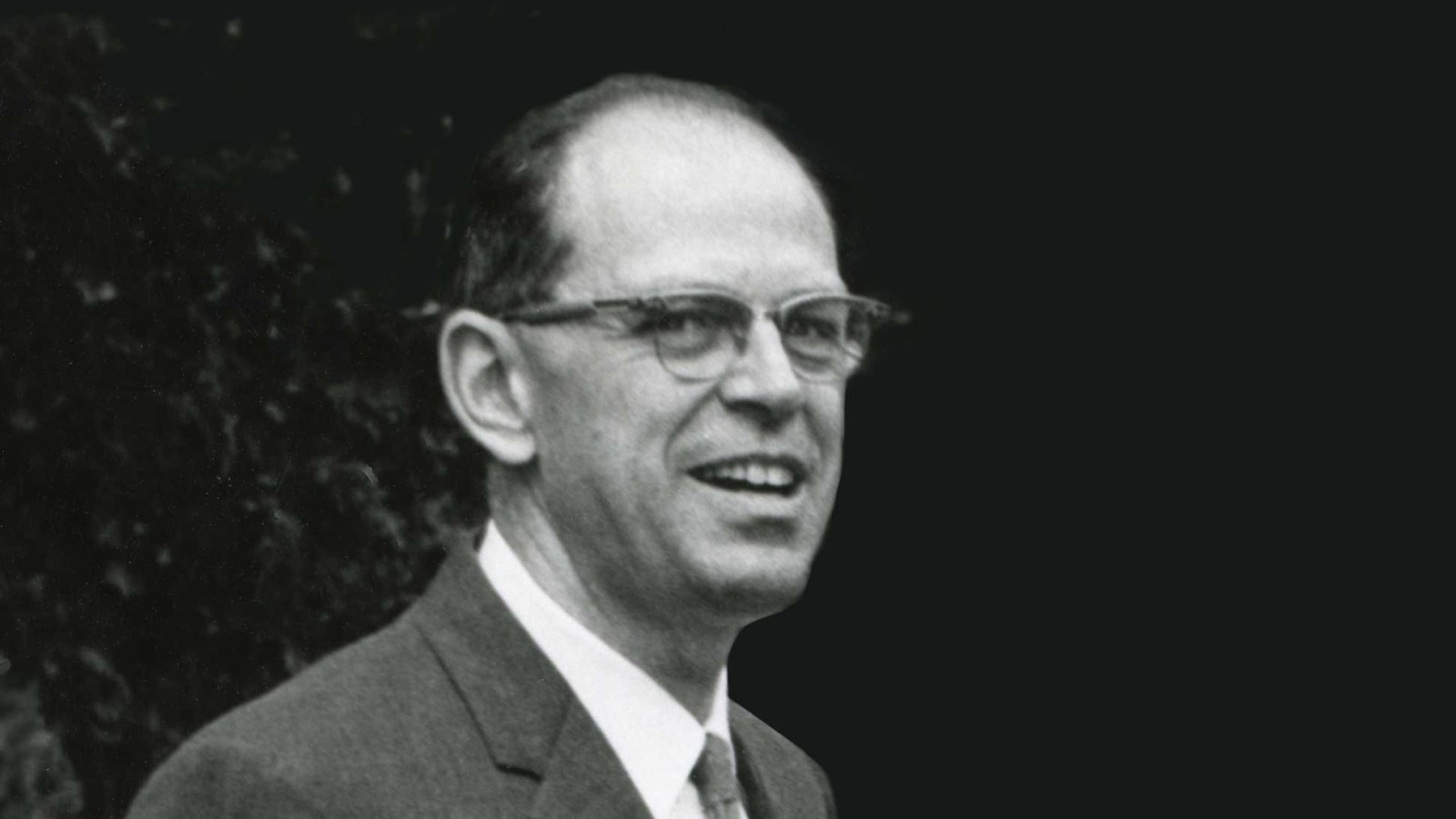man in suit and glasses