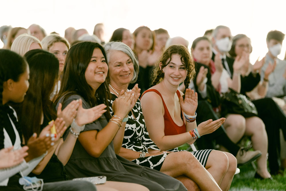 people clapping at event