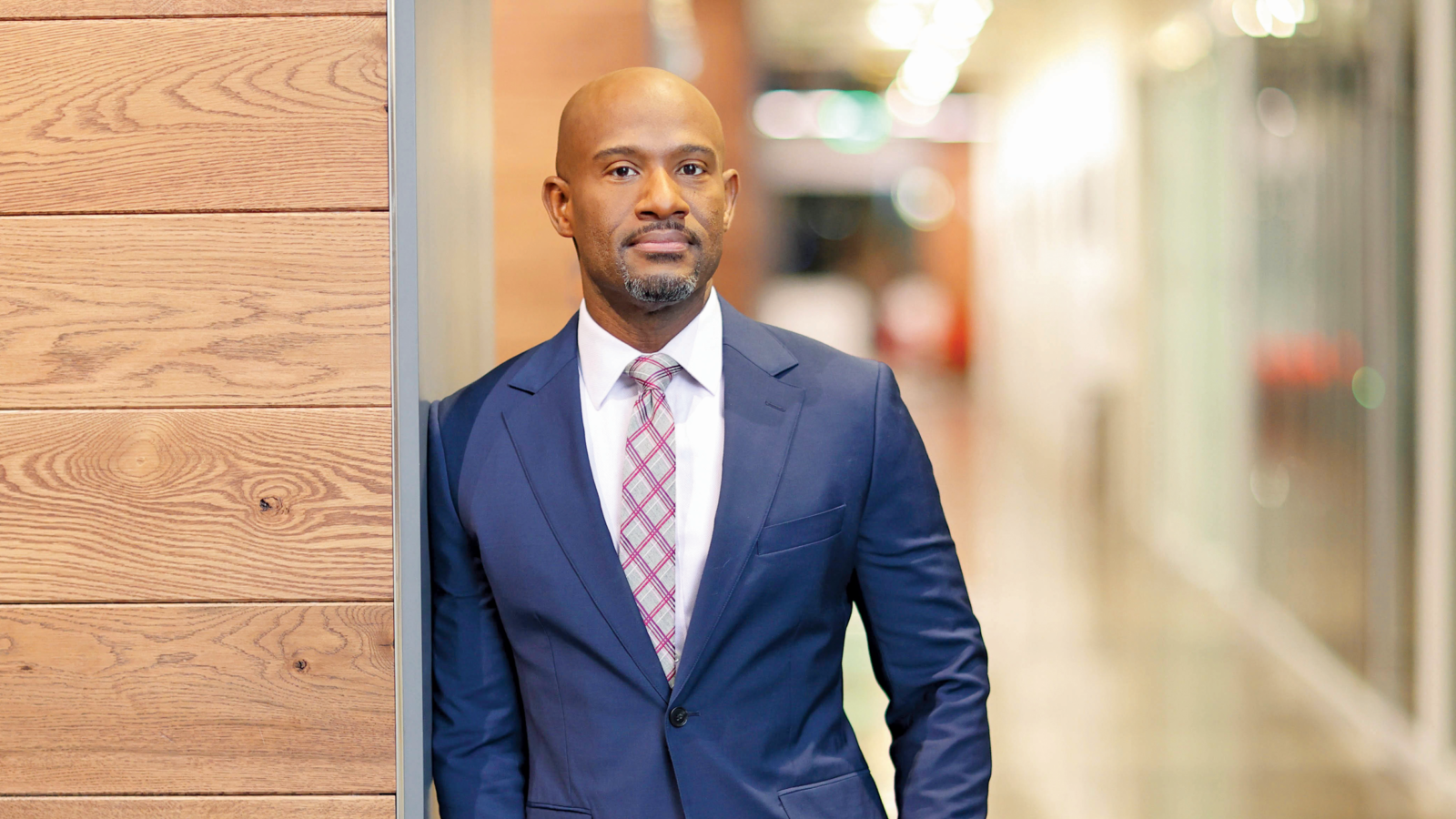 man in suit in hallway