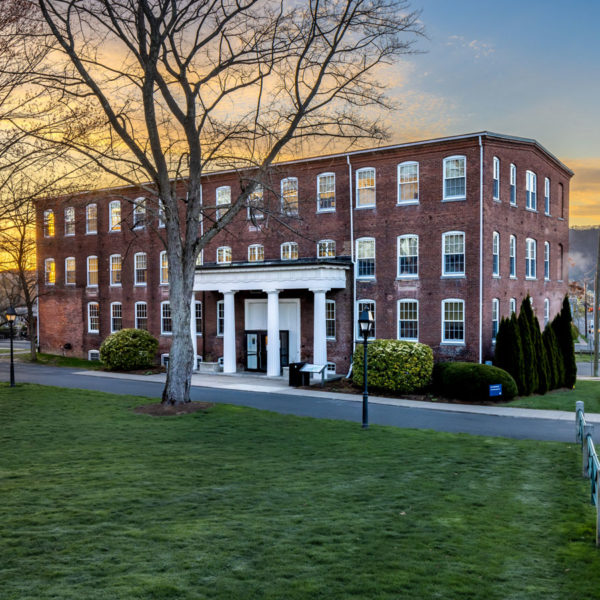 Schoolhouse building and sign at Williston
