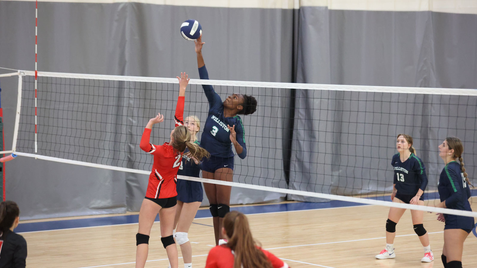 girls playing volleyball