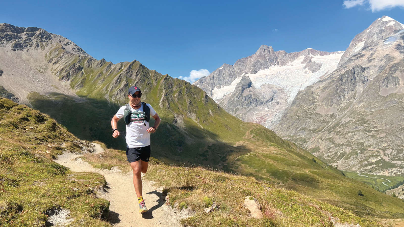 teacher running with mountains in background