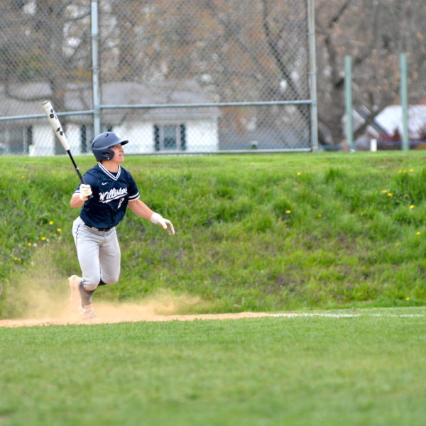 Baseball batter, catcher watch ball off screen