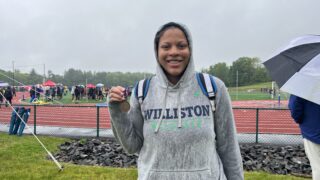 Jurnee Jones '23 poses with gold medal after NEPSTA DII championships