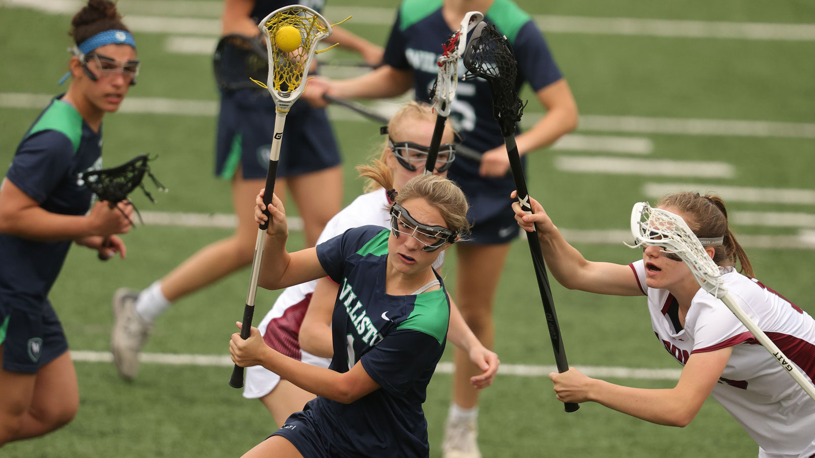 girls playing lacrosse