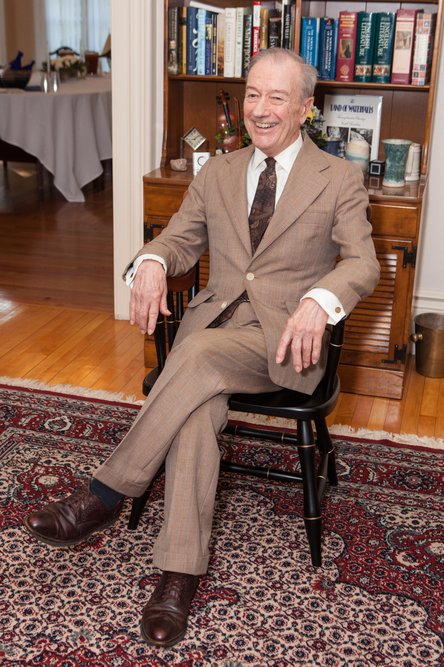 Dick Gregory sits in Richard C. Gregory Faculty Chair