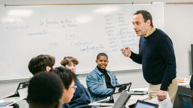 teacher and students in Spanish class