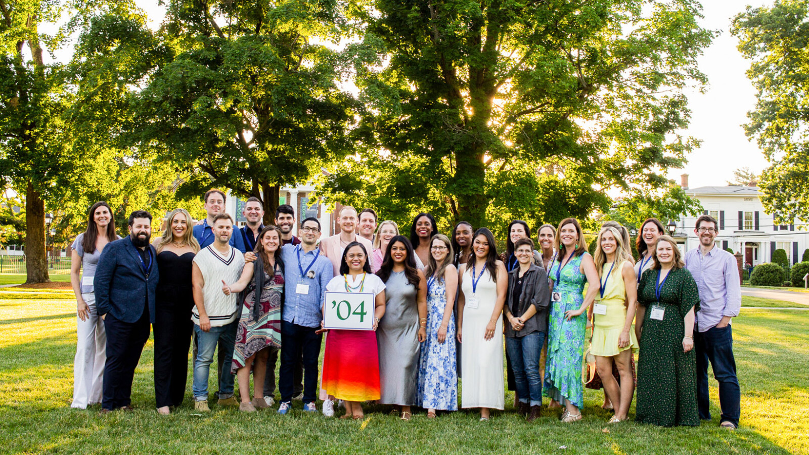 group of people posing on lawn