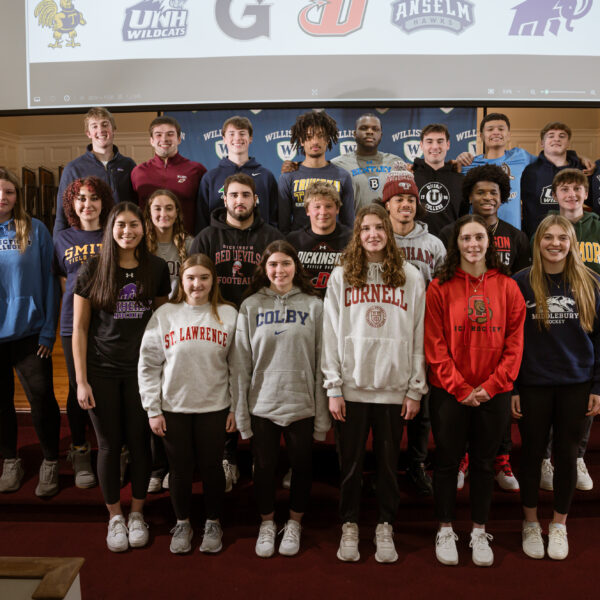 students with college sweatshirts