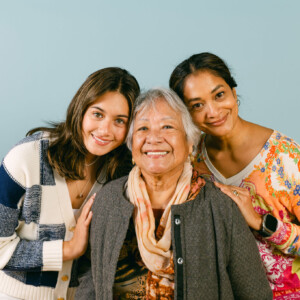 20240426_Zacek_Grandparents-(107)-web three women posing on a blue background