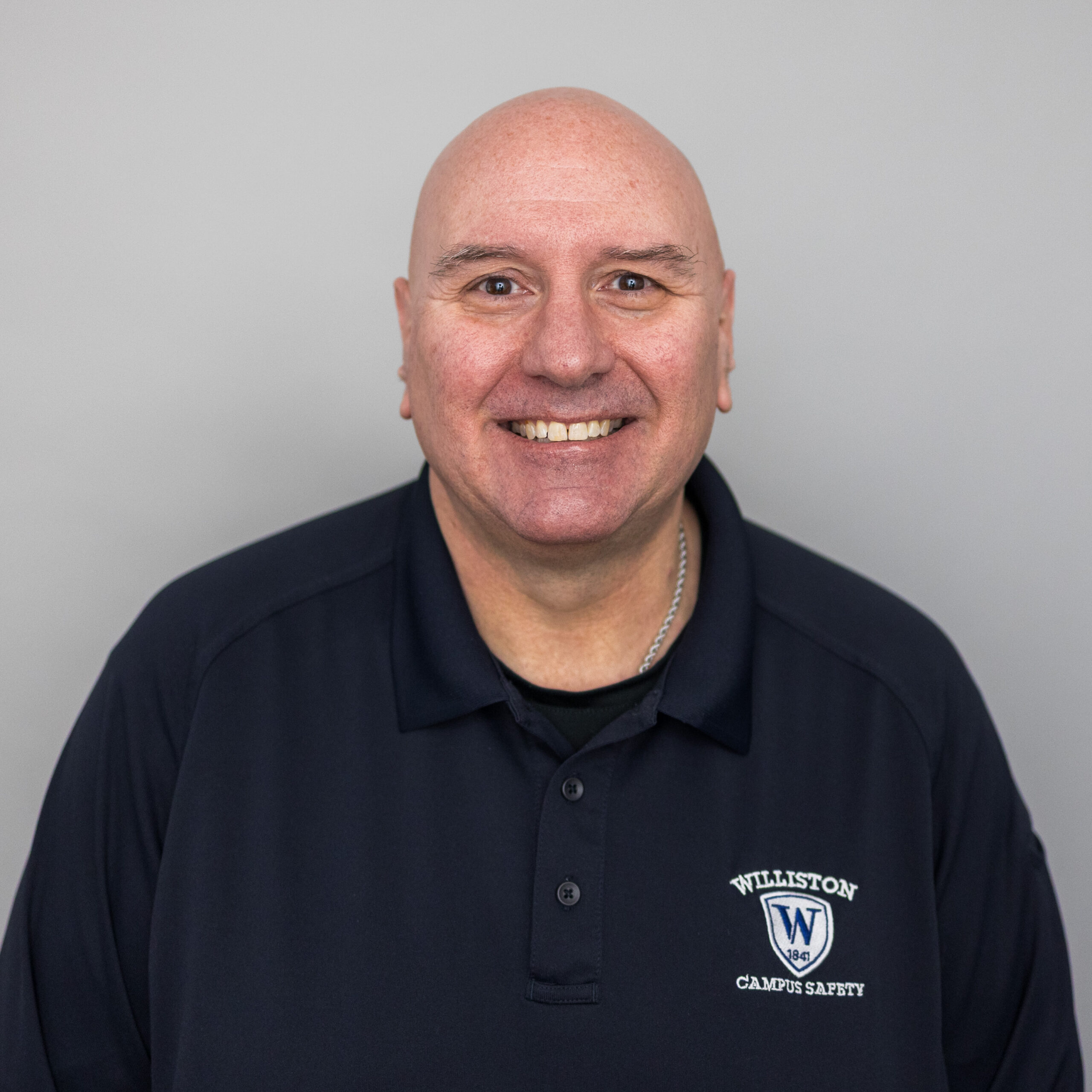 man in uniform smiling