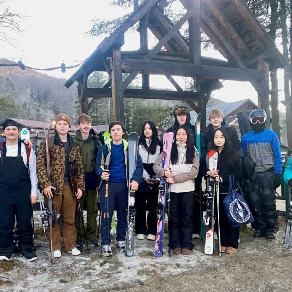 Twelve Williston students pose for picture at Berkshire East with their skis