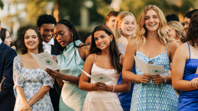 students at an outdoor formal event