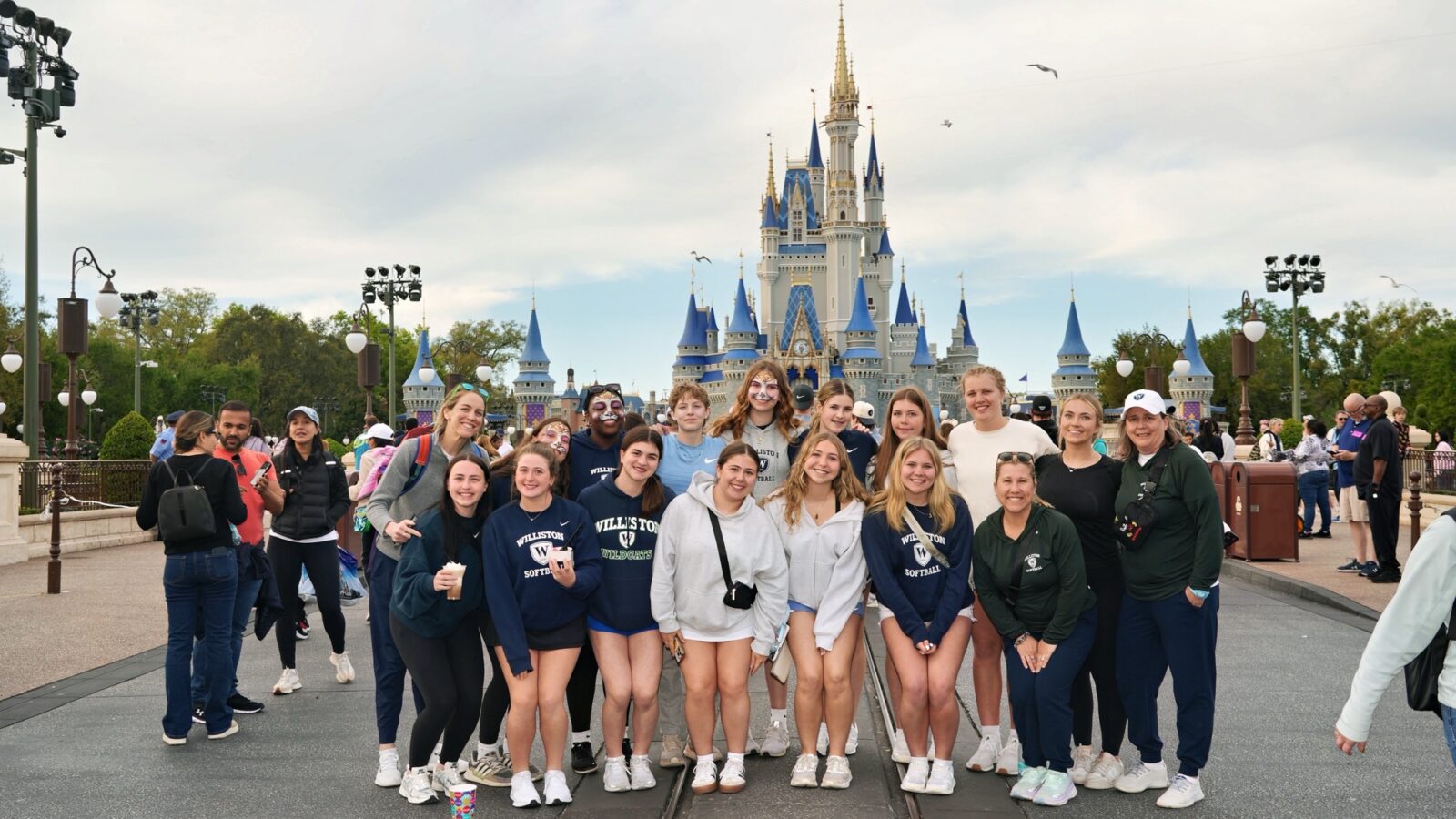 Williston softball players, coaches pose for picture at Disney World