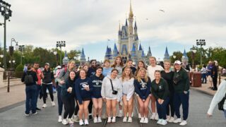 Williston softball players, coaches pose for picture at Disney World