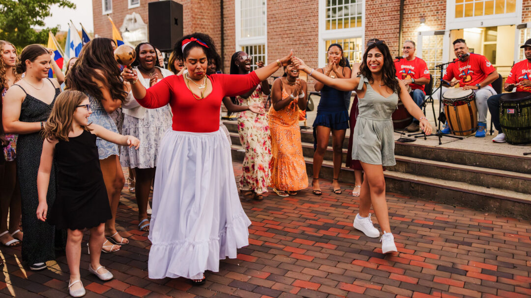 students dancing with visiting artists