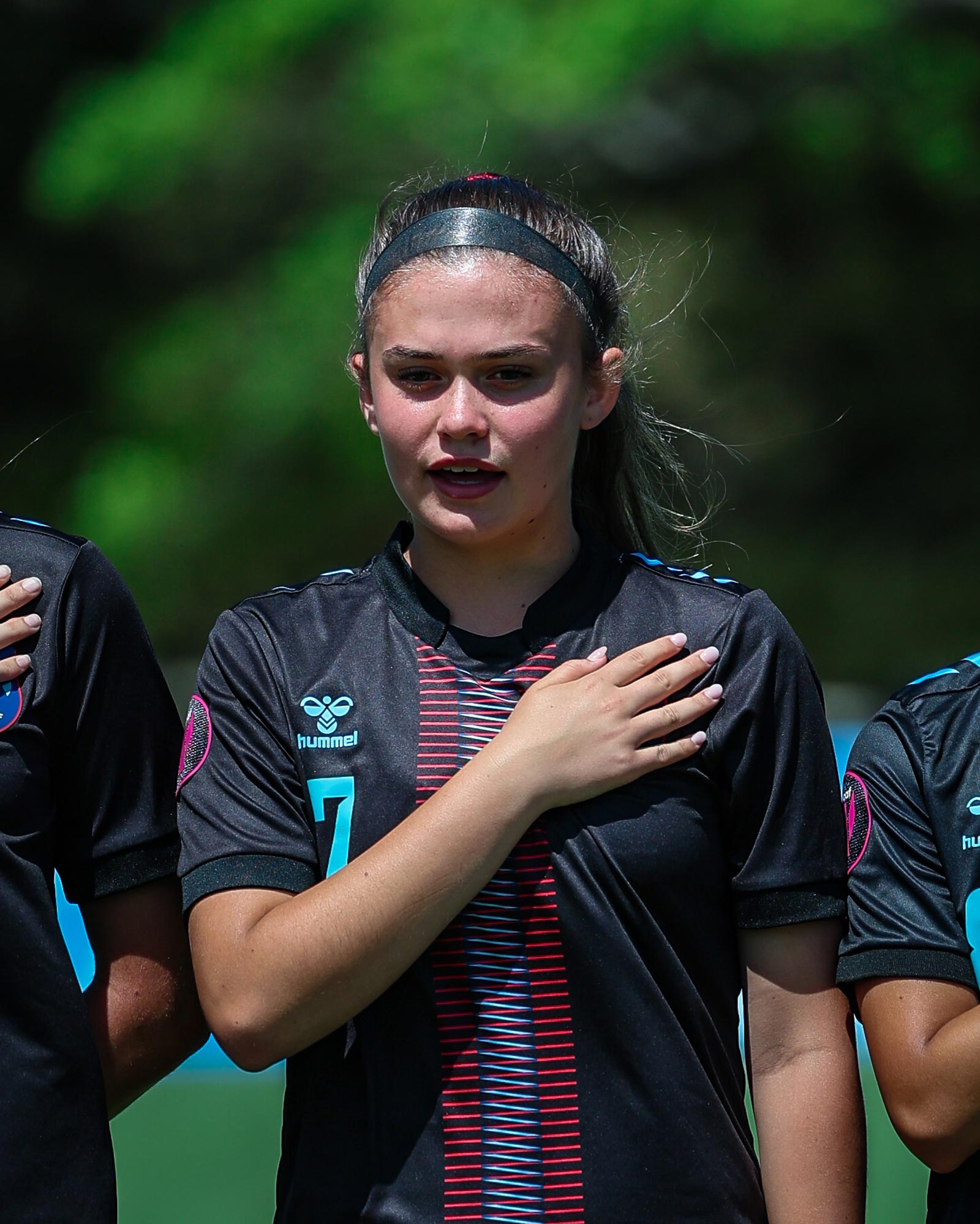 Girl in soccer uniform
