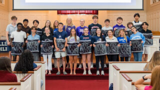 Williston students hold up their Blanket Awards during Athletic Awards assembly