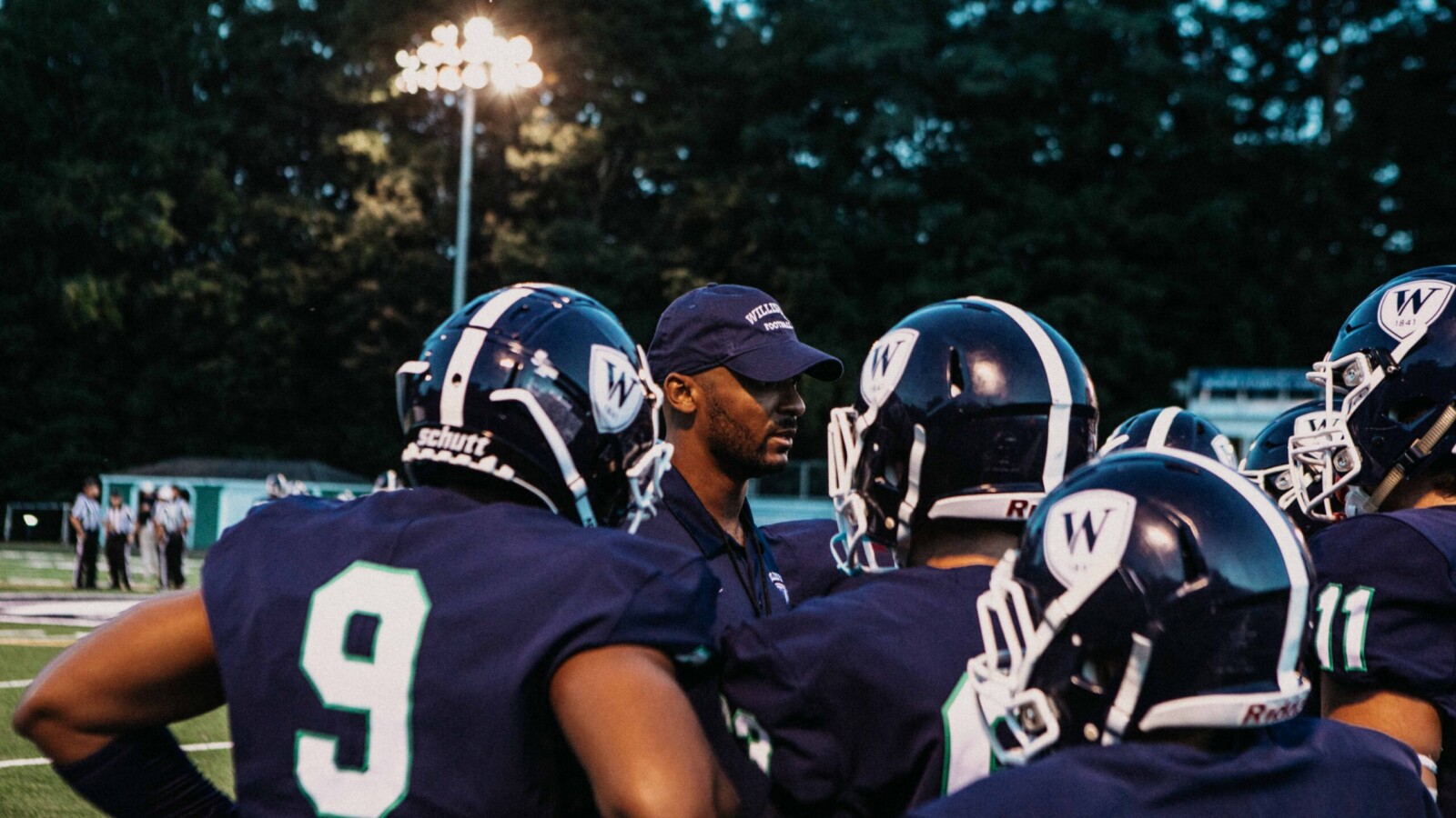 football players under the lights