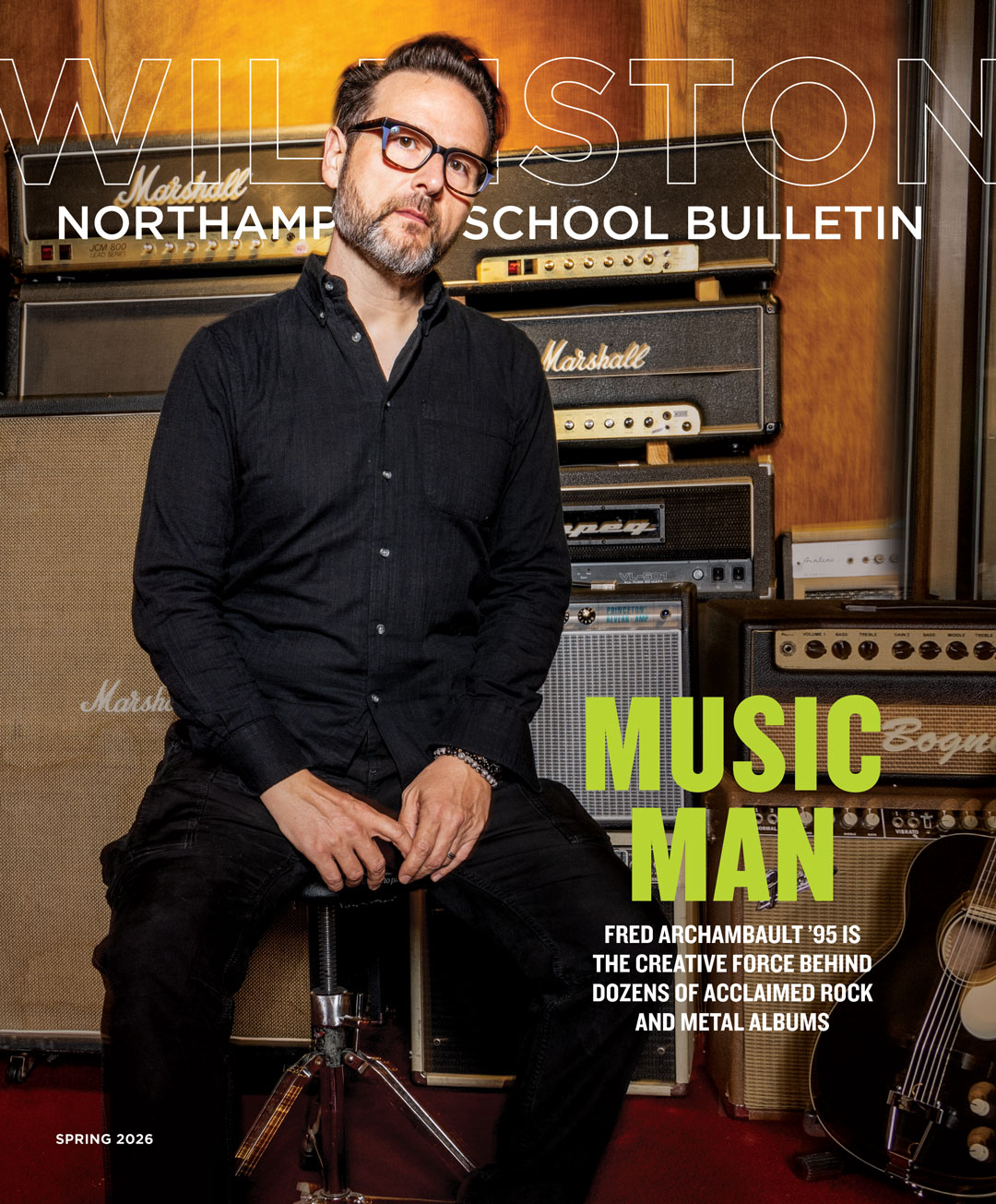 Magazine cover with man sitting on stool in front of guitar amplifiers