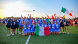 Girls lacrosse players celebrate winning game